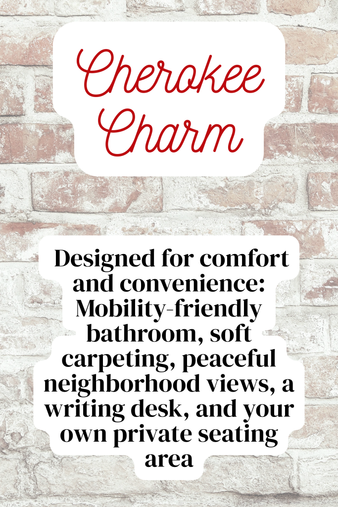 Cozy mobility-friendly assisted living suite with private seating and neighborhood views.